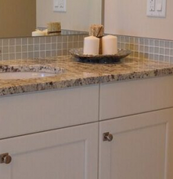 bathroom vanity with marble countertop