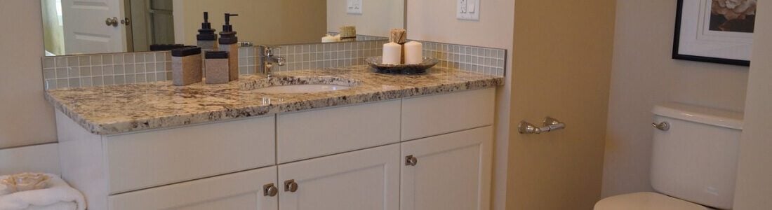 bathroom vanity with marble countertop